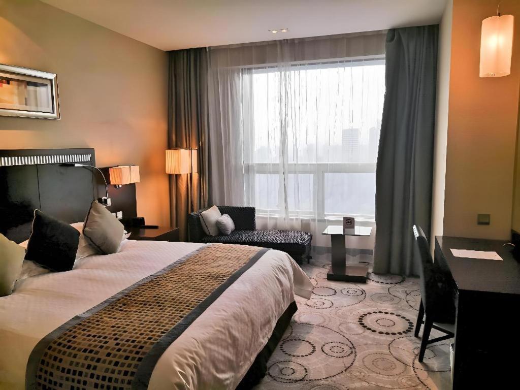 שנגחאי Grand Soluxe Zhongyou Hotel מראה חיצוני תמונה